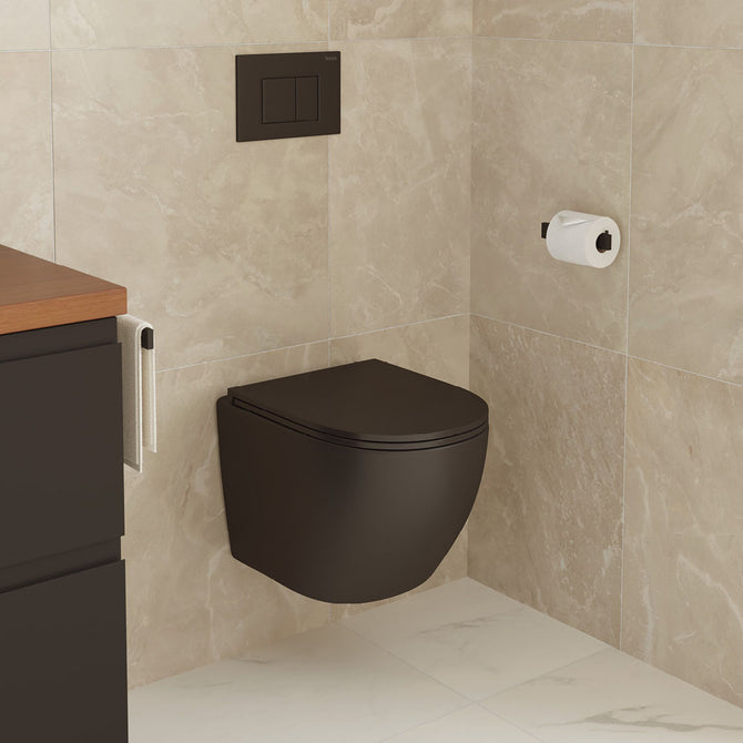 Stylish bathroom with a black wall-mounted toilet, flush plate, and beige tiled walls.